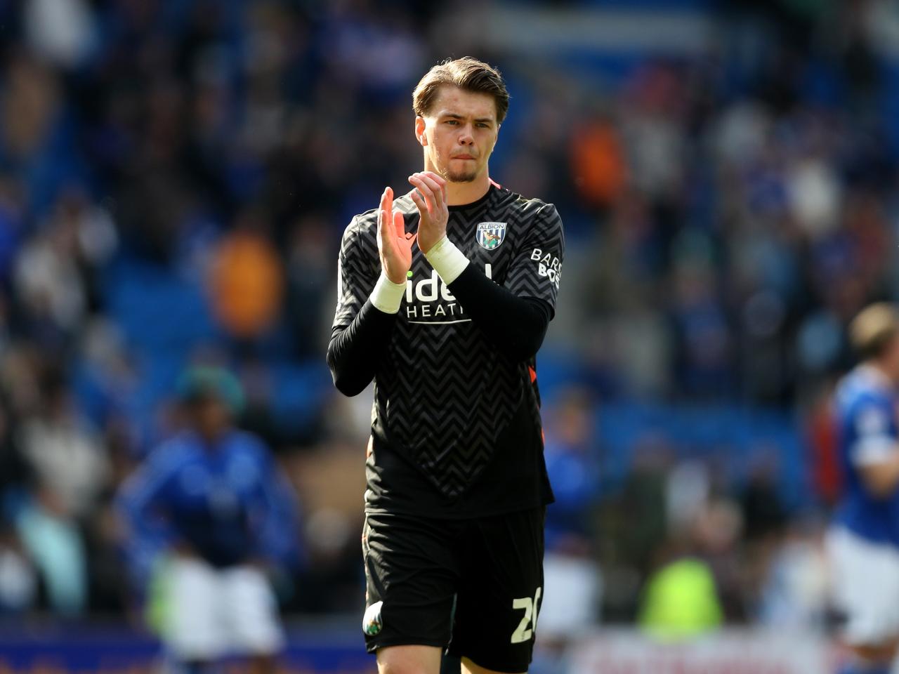 Josh Griffiths applauds Albion fans after the draw with Cardiff