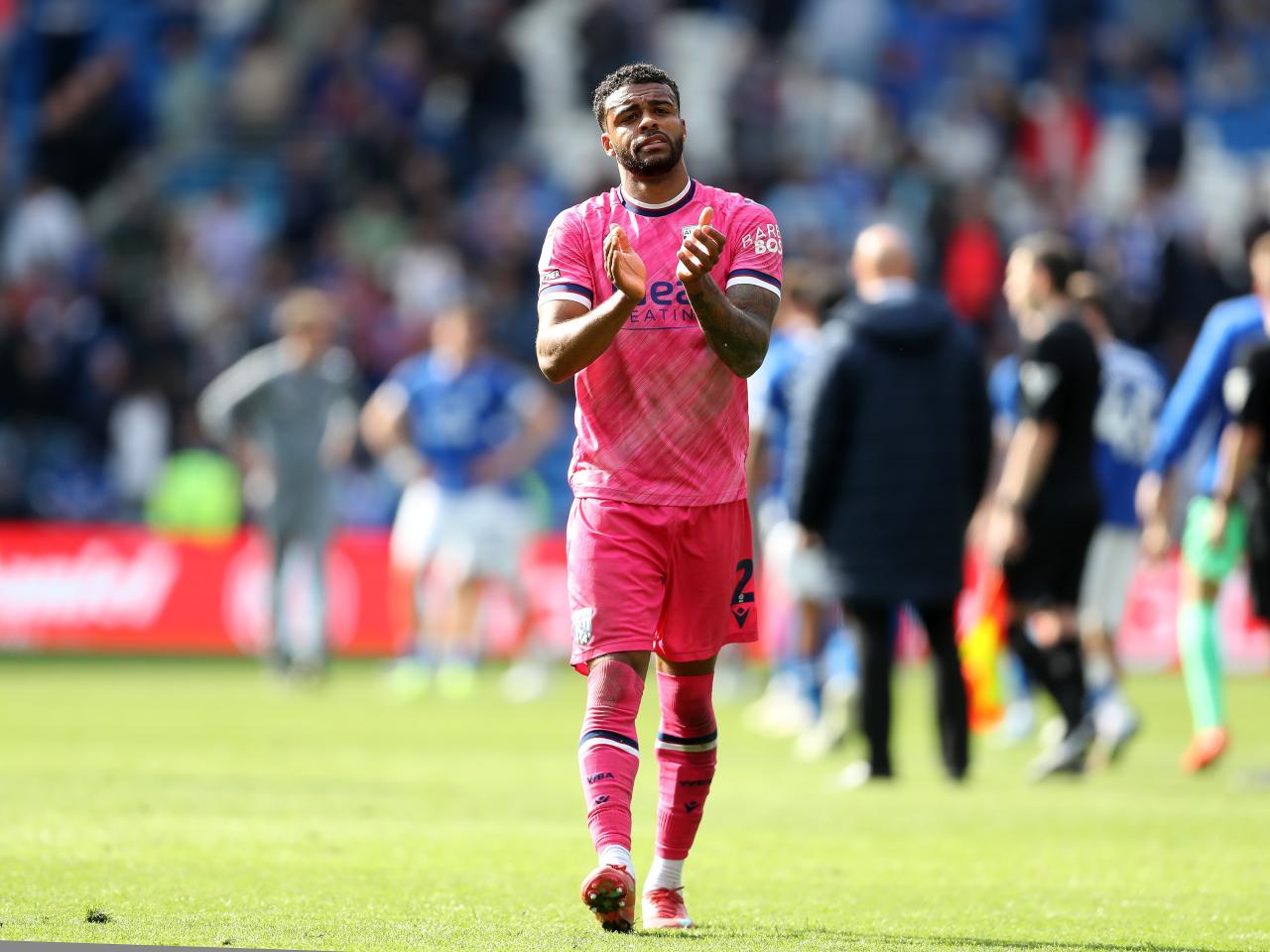 Darnell Furlong applauds Albion fans after the draw with Cardiff