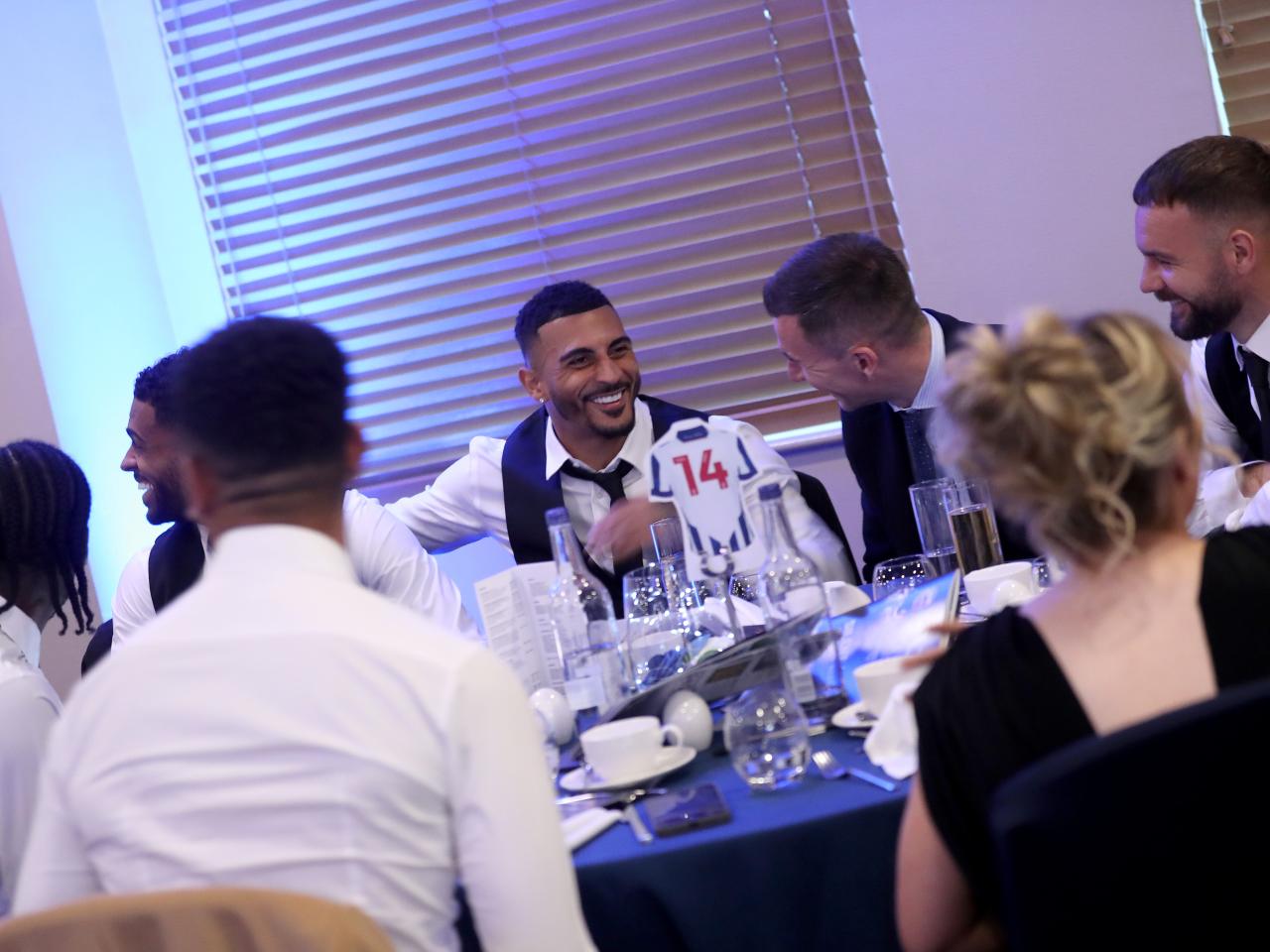 Several Albion players sat round a table at the end of season awards dinner