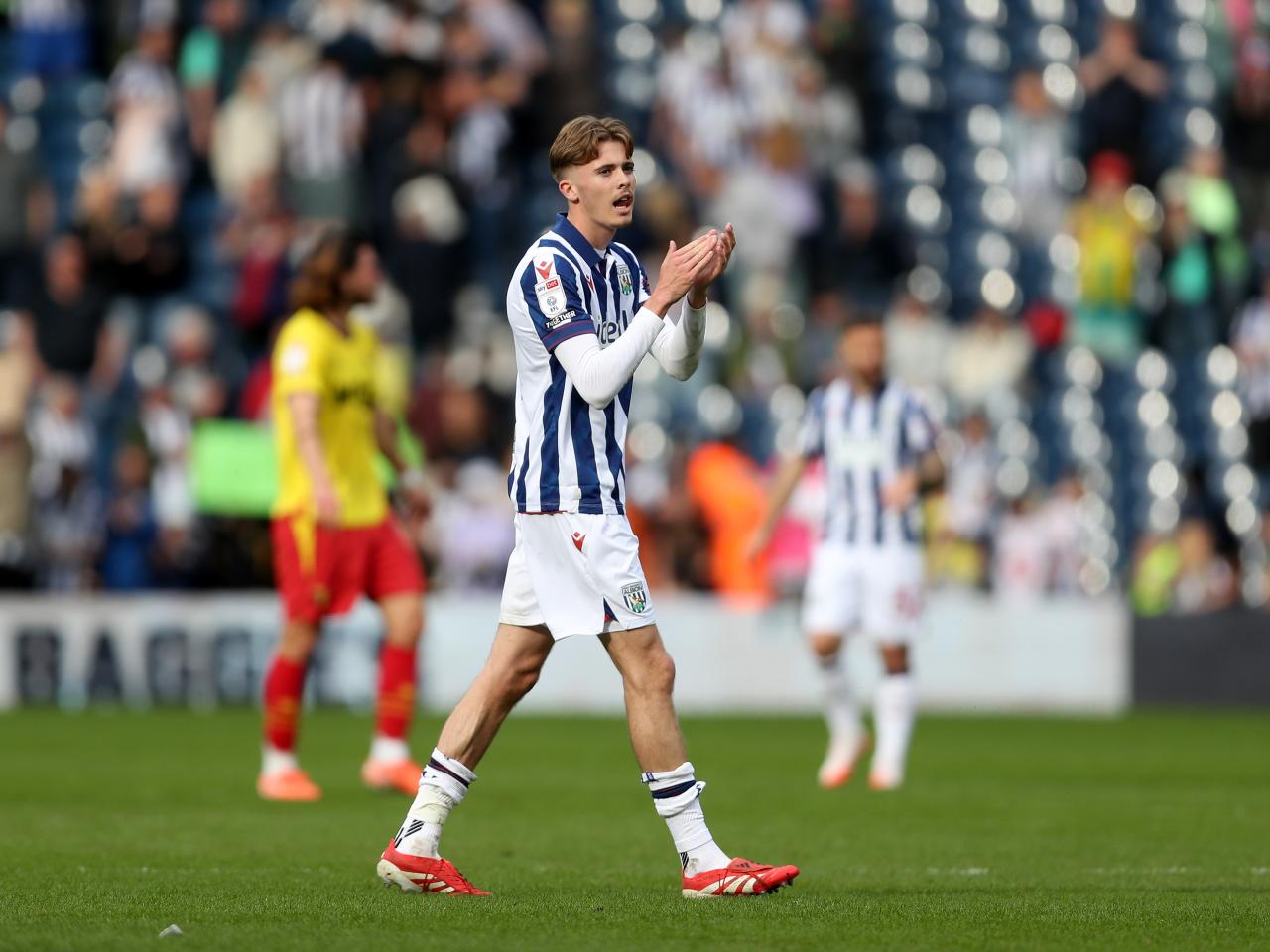 Isaac Price applauding WBA fans at the end of the Watford game