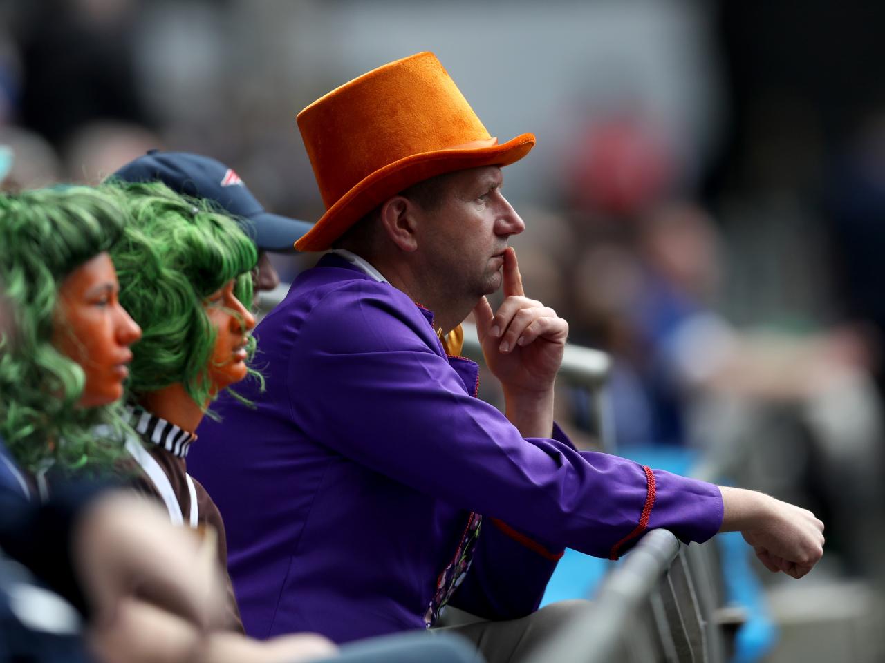 Albion fans in fancy dress in the away end at Cardiff