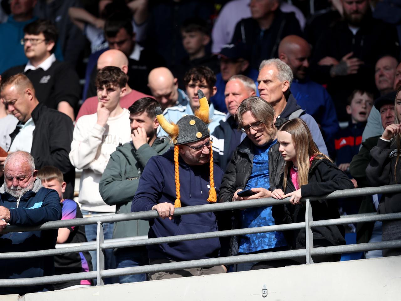 A general view of several Albion fans in the away end at Cardiff