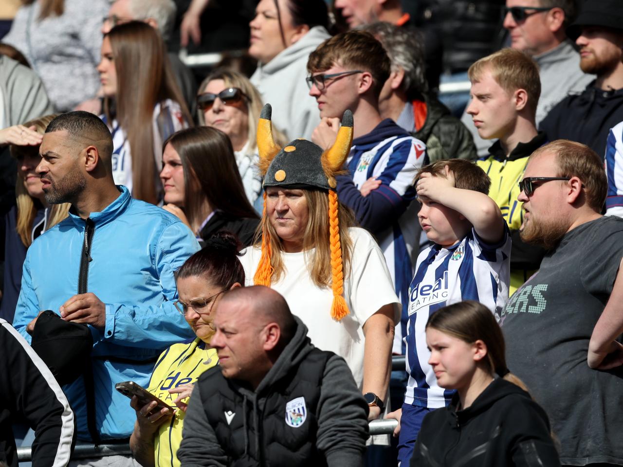 A general view of several Albion fans in the away end at Cardiff