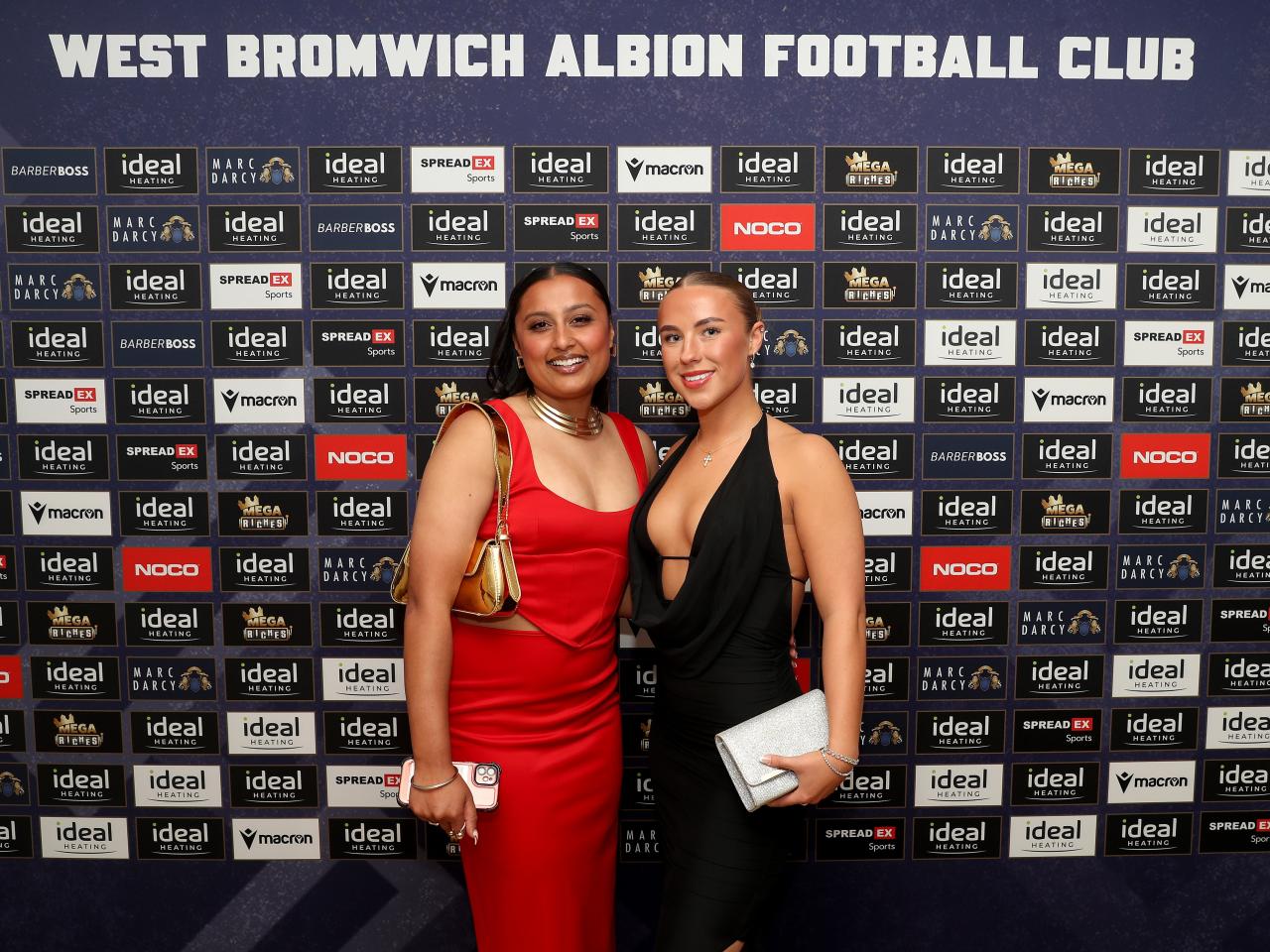 Albion Women players Simran Jhamat and Seren Watkins pose for a photo at the end of season awards dinner