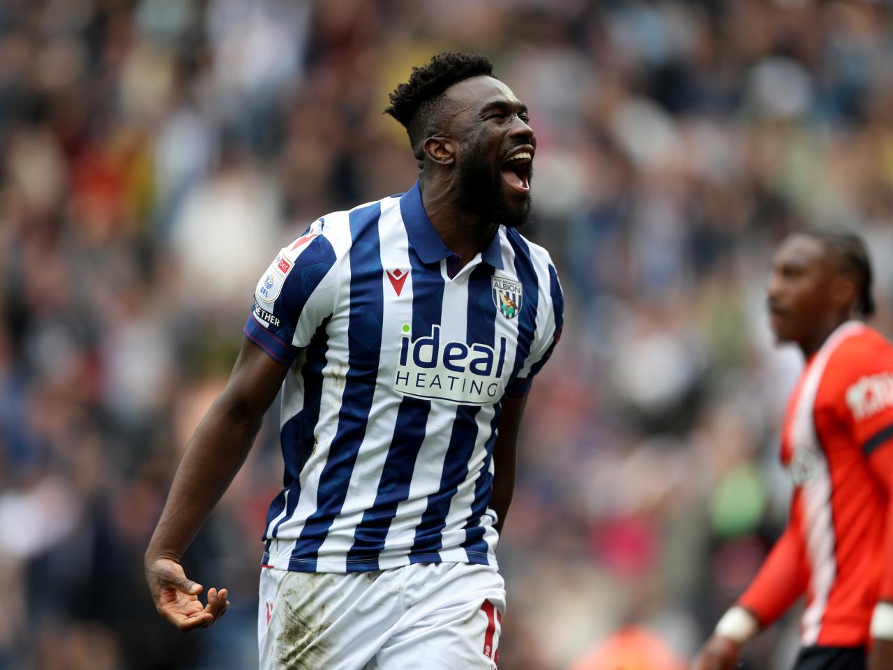 Daryl Dike celebrates after scoring against Luton Town