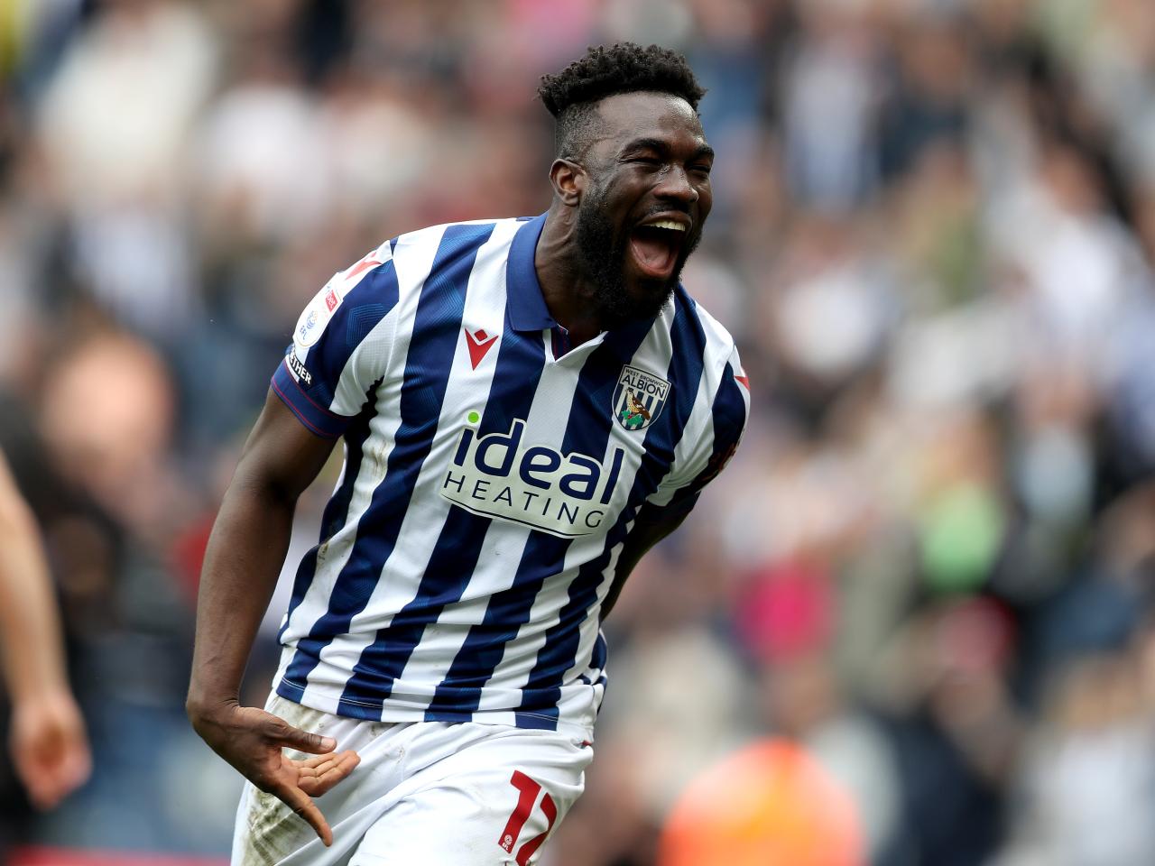 Daryl Dike celebrates after scoring against Luton Town
