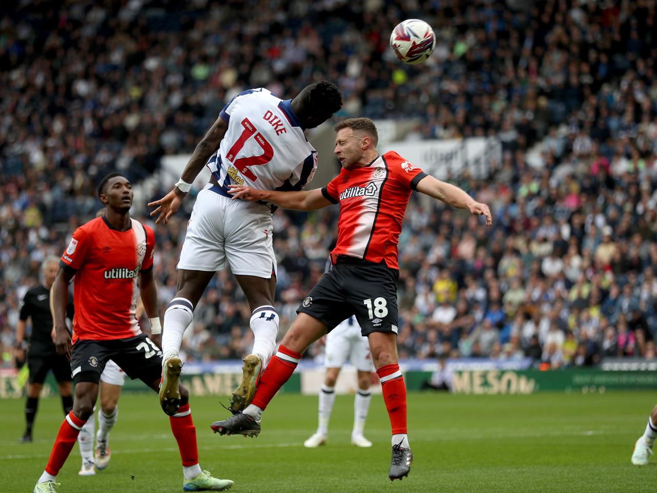 Daryl Dike scoring a header against Luton Town