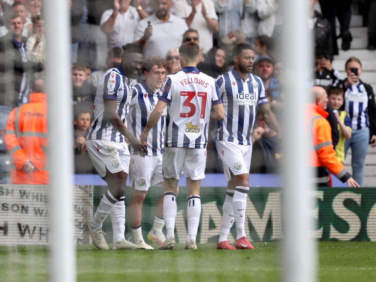 Callum Styles celebrates scoring against Luton Town with team-mates
