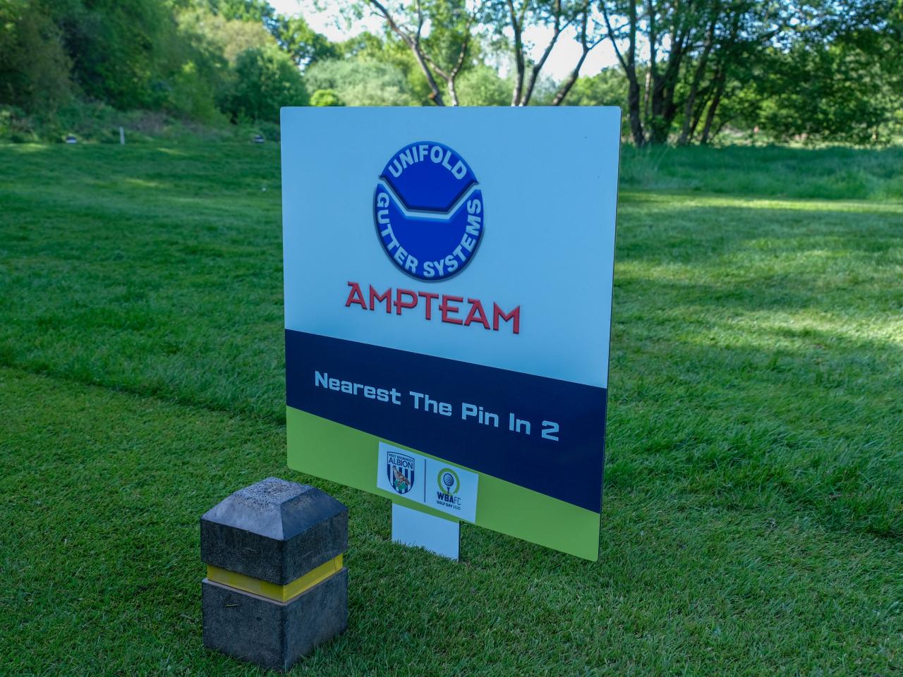 Nearest The Pin in 2 Sponsor Sign - Ampteam Ltd