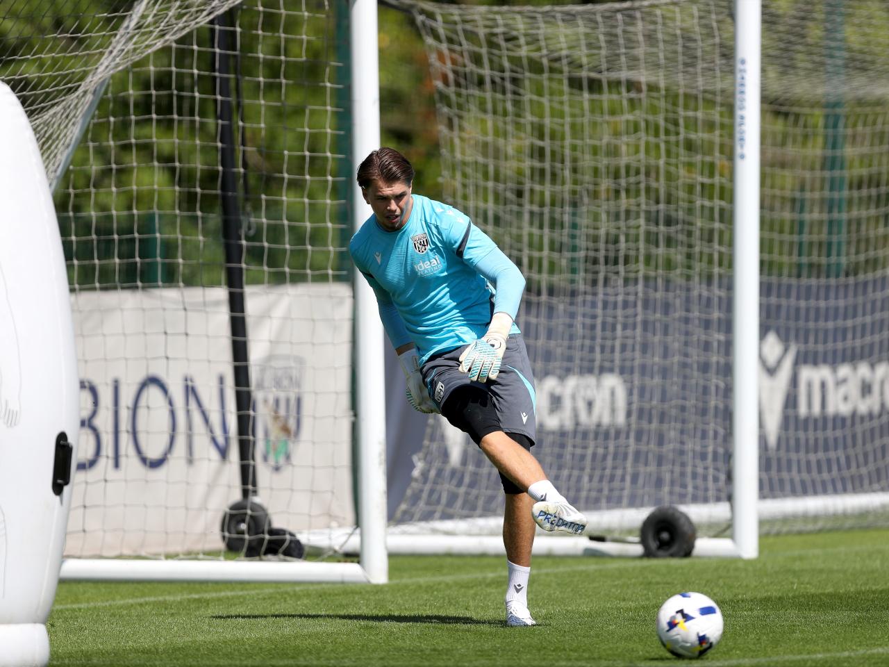 Josh Griffiths passing a ball during a training session