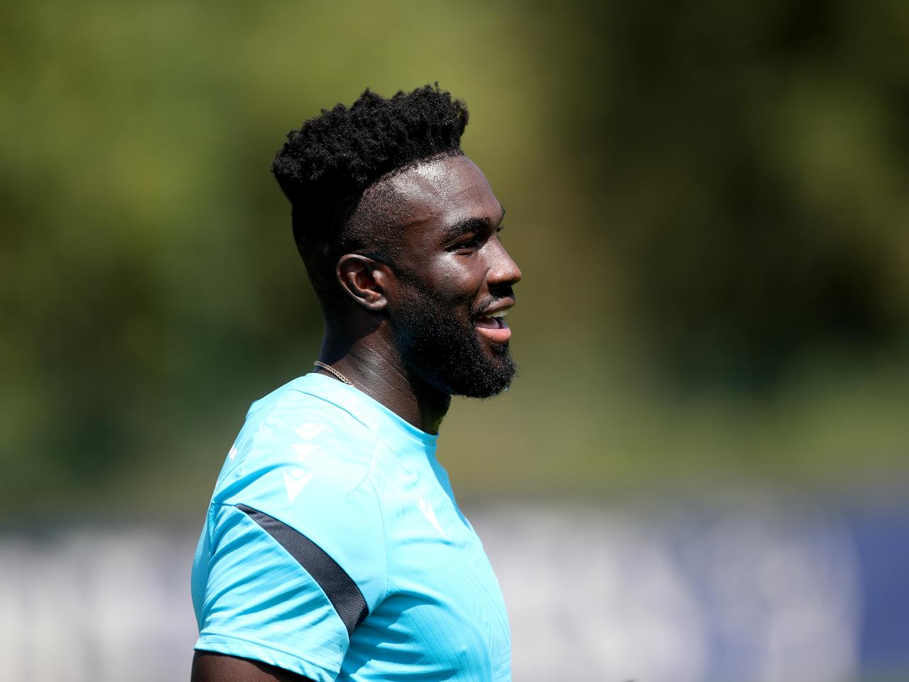 A close-up of Daryl Dike smiling during a training session