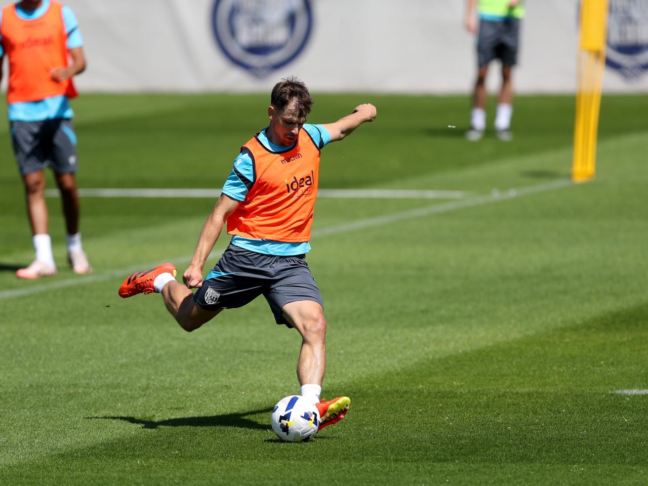 Jayson Molumby striking the ball during a training session
