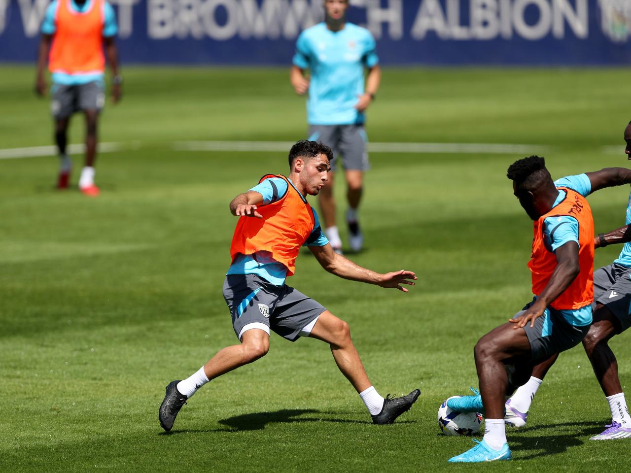Tammer Bany, Daryl Dike and Devante Cole all battling for the ball during training