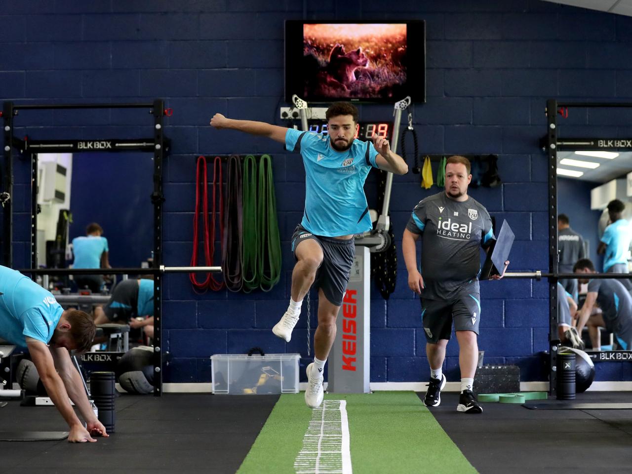 Mikey Johnston carrying out a jumping test in the gym