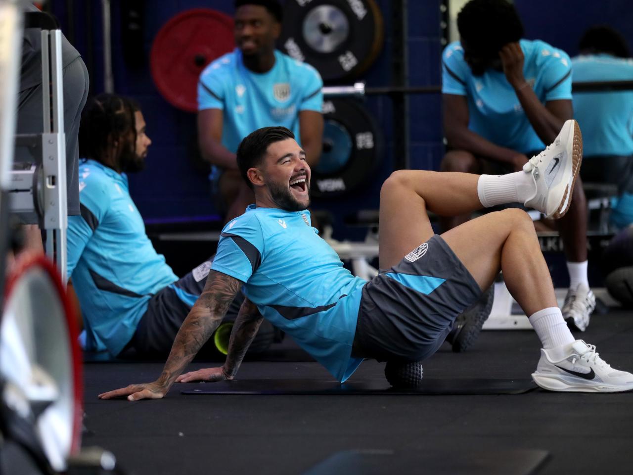 Alex Mowatt laughing in the gym