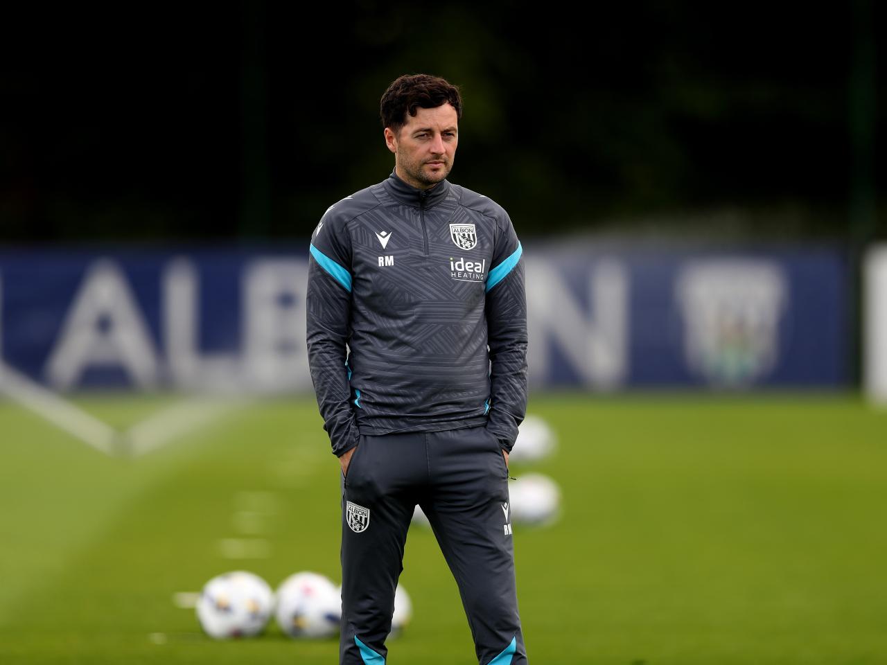 Ryan Mason watching training