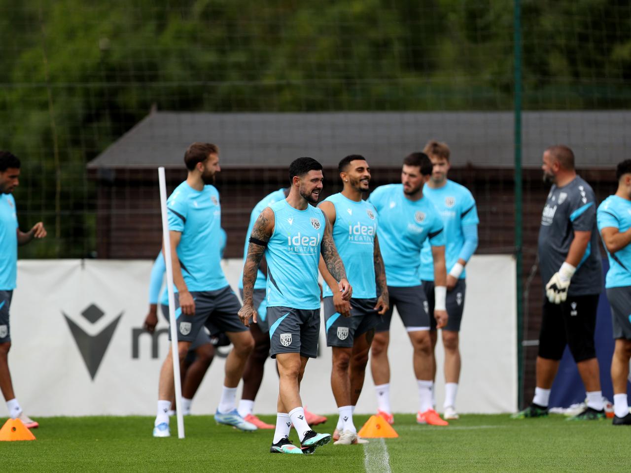 Several Albion players getting ready to start a training session