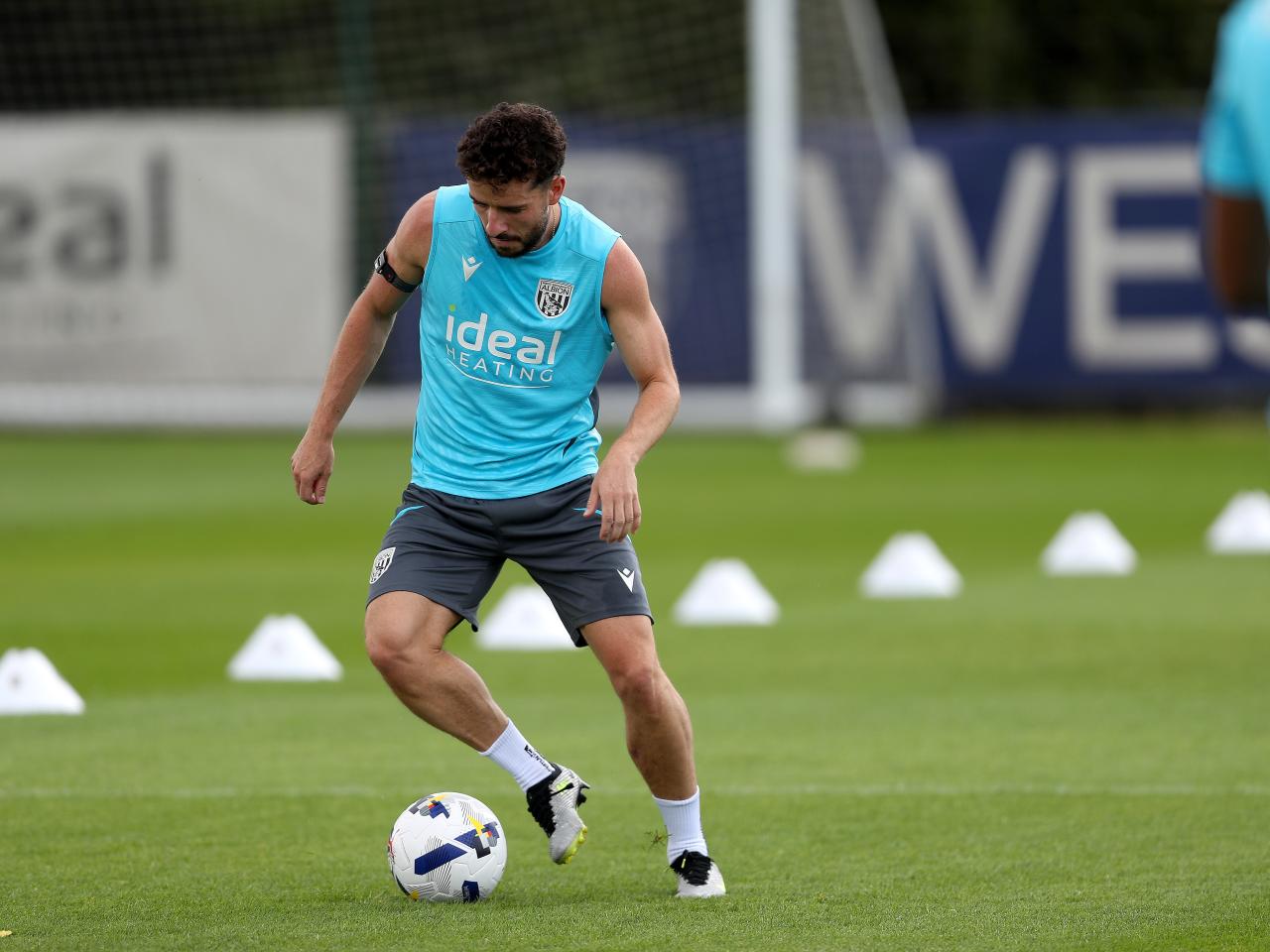 Mikey Johnston on the ball during a training session
