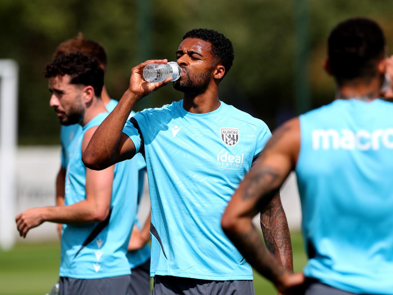 Darnell Furlong drinking water during a break in a training session