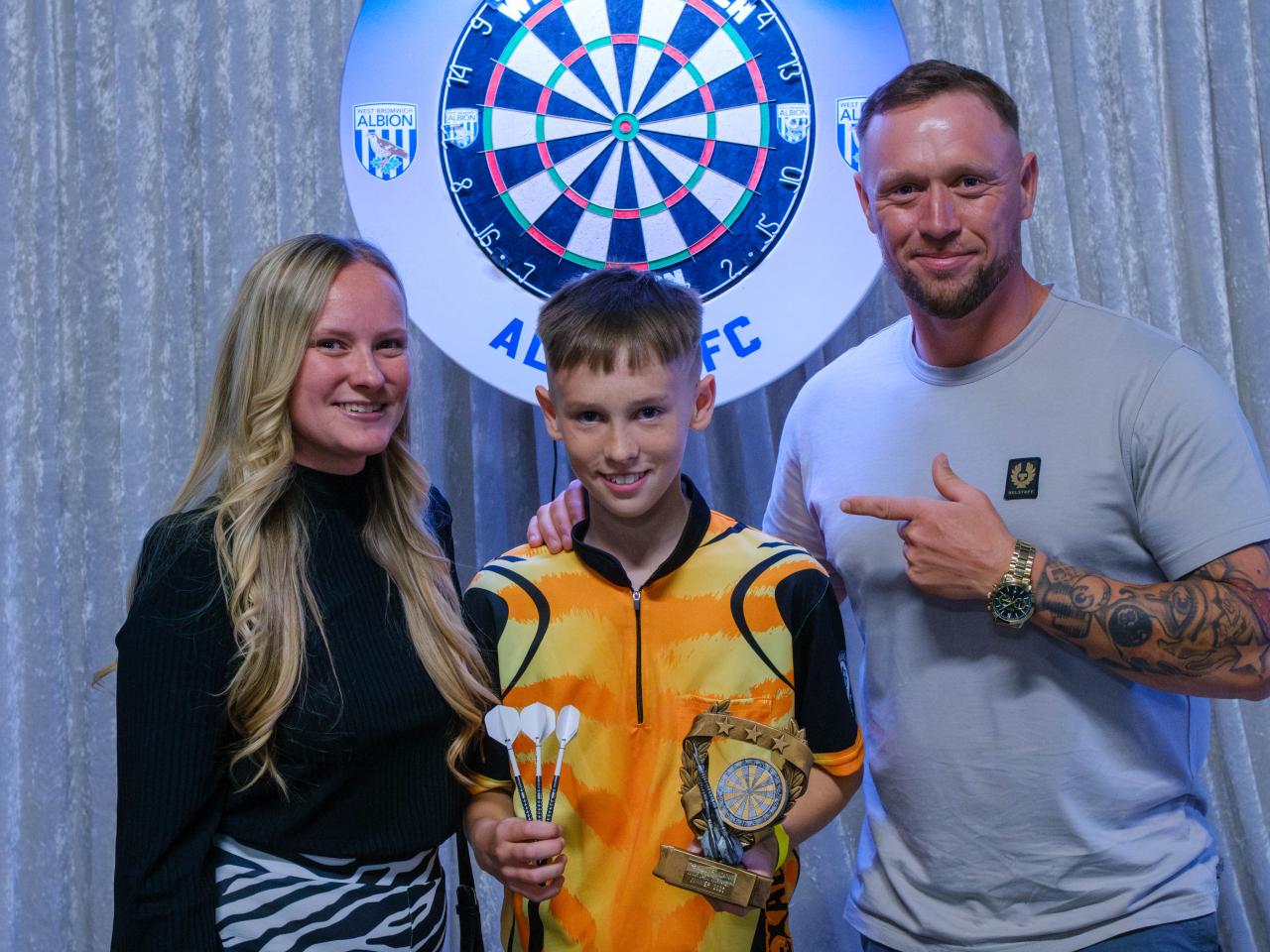 Codey ‘The Conqueror’ and his parents.