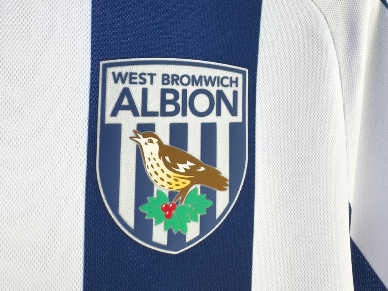 Our 2025/26 home kit. It shows the Albion crest in full on the front of the chest.
