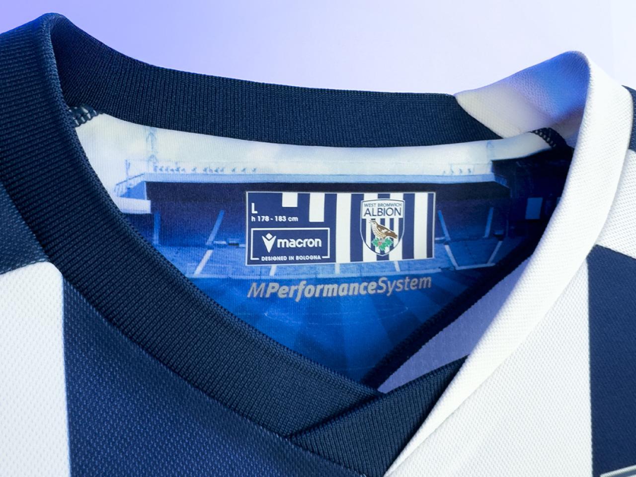 Our 2025/26 home kit. A shot of the inside of the collar, featuring a motif of The Hawthorns.