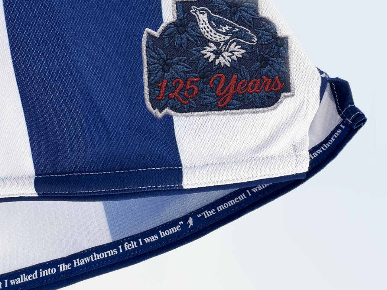 Our 2025/26 home kit. The hem of the shirt, featuring a quote from Tony Brown, which reads: "The moment I walked into The Hawthorns I felt I was home."