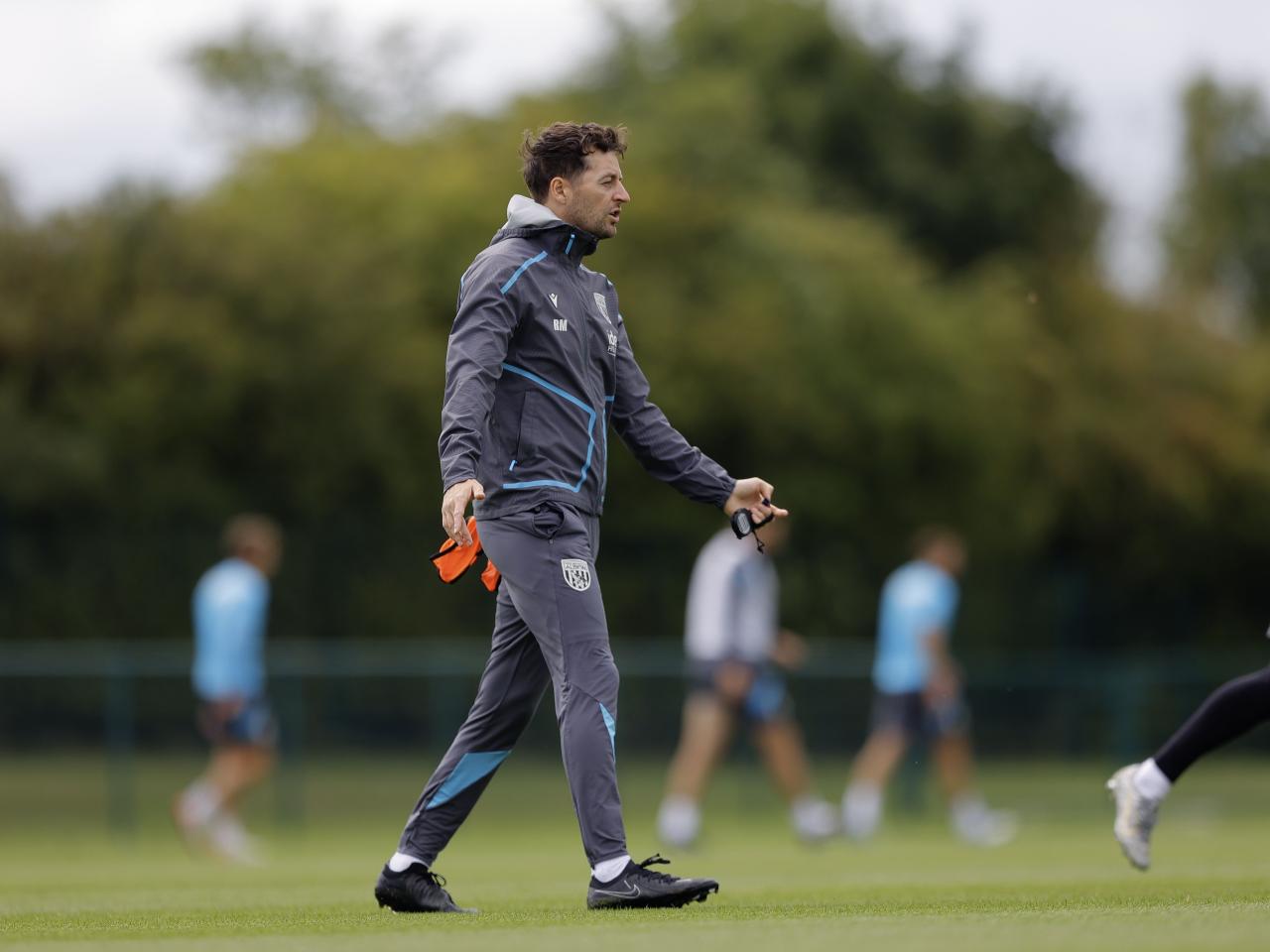 Ryan Mason delivering instructions during a training session