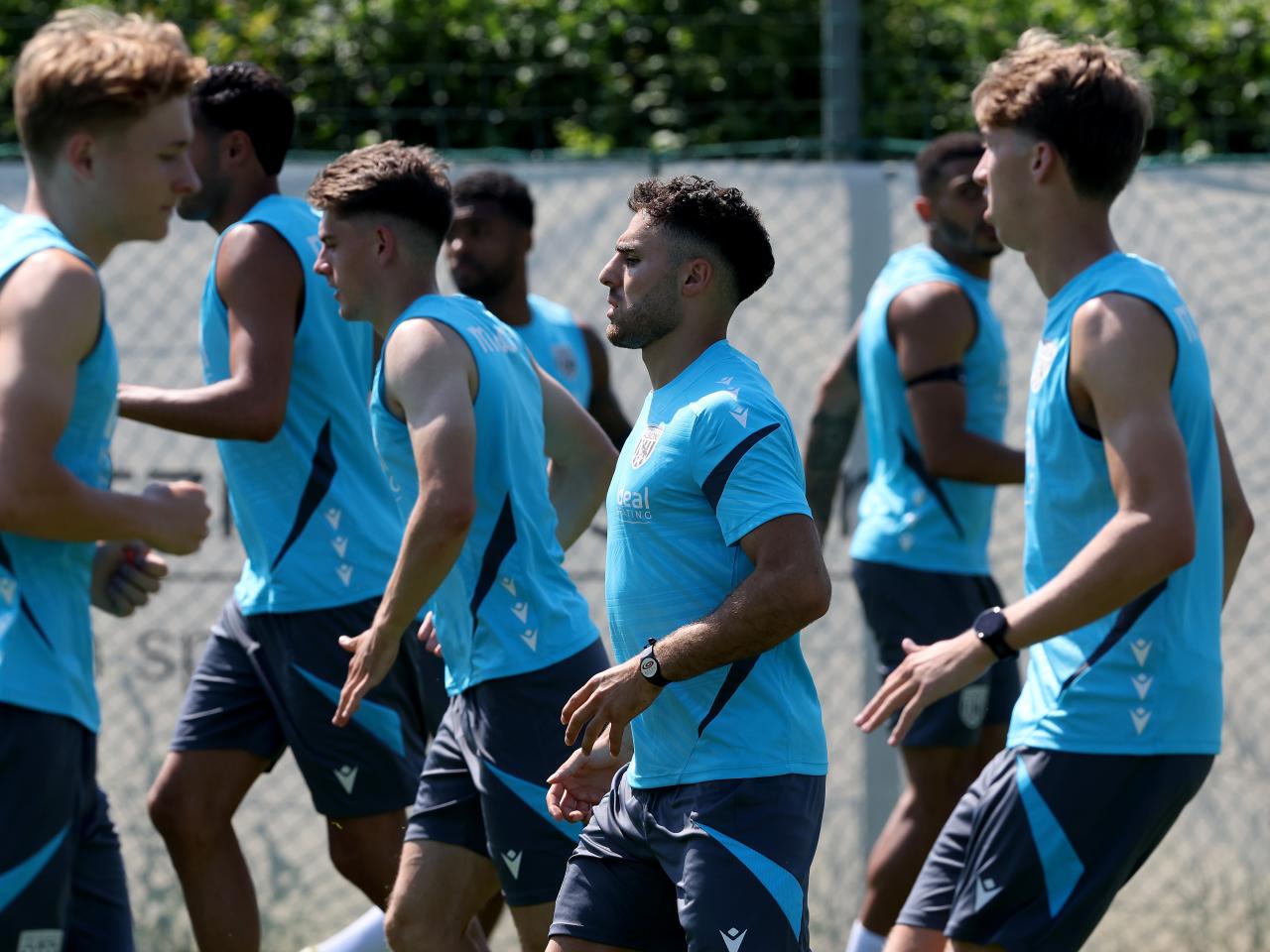 Several players warming up before a training session