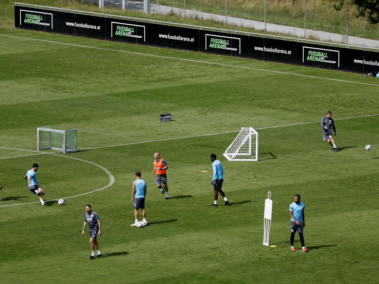 A general view of training from a vantage point with the pitch at the bottom of the hills