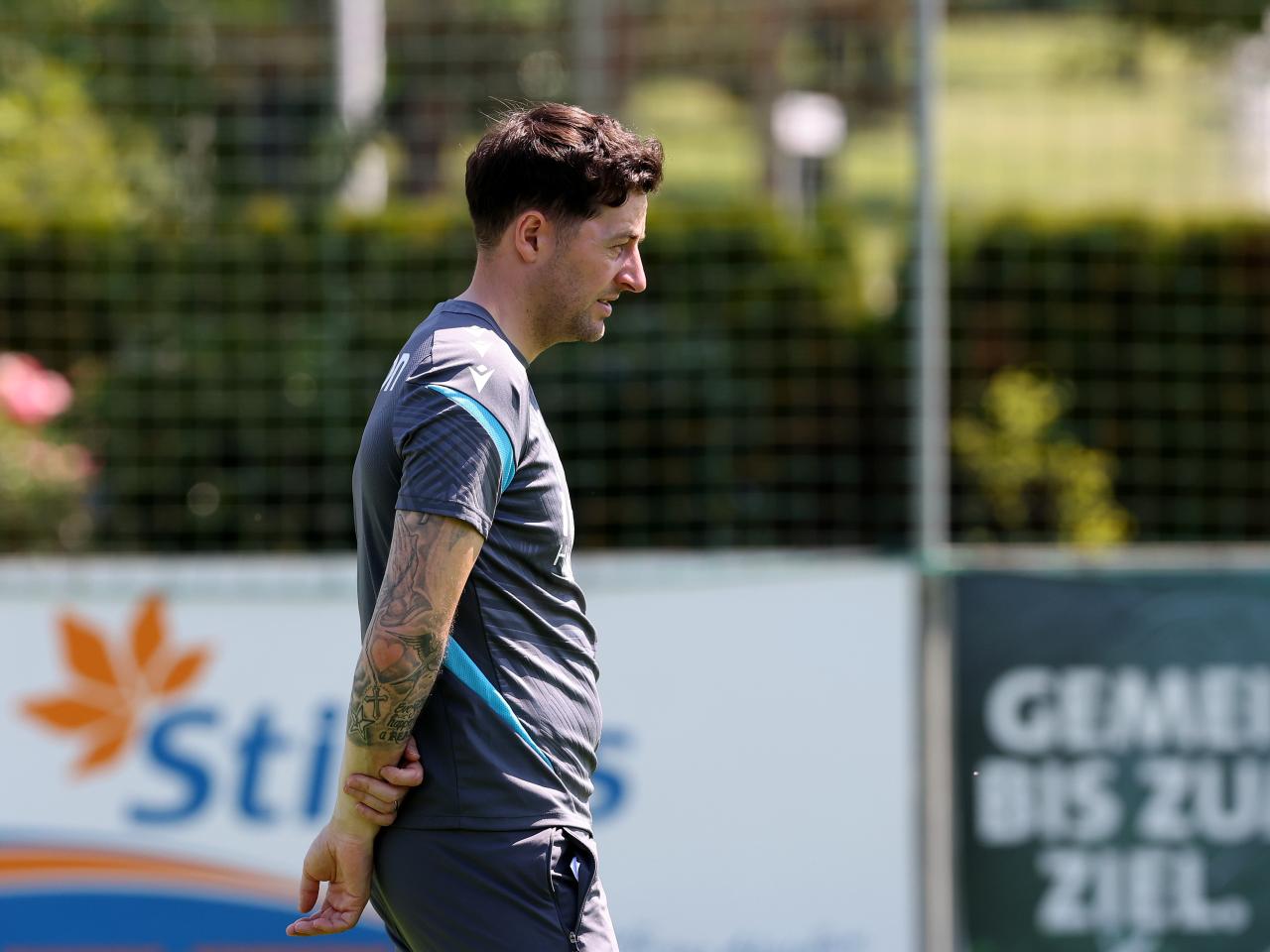 Ryan Mason watching a training session in Austria