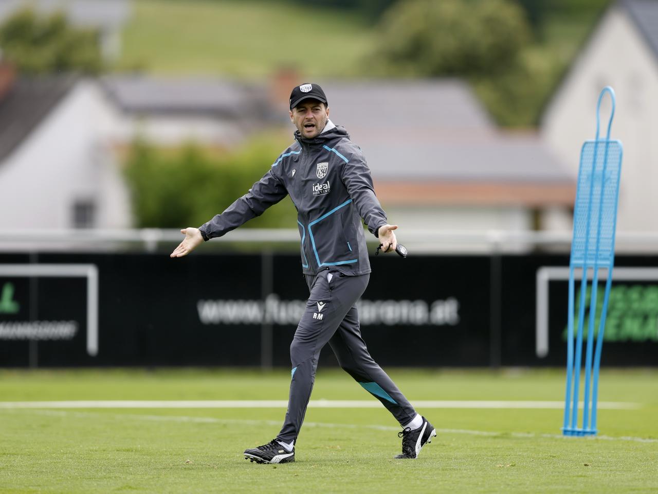 Ryan Mason giving instructions on the training pitch