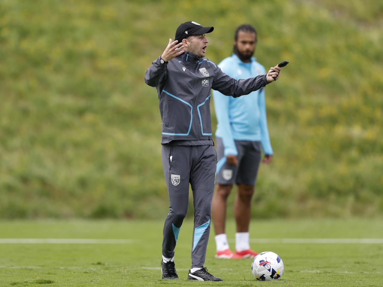 Ryan Mason giving instructions on the training pitch