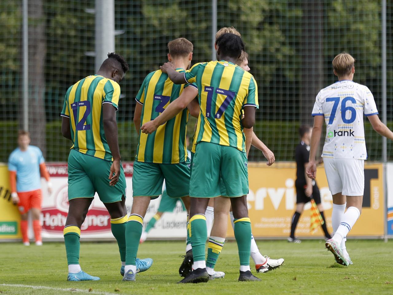 Nat Phillips celebrates with Daryl Dike and Ousmane Diakité after scoring against Dynamo Kyiv 