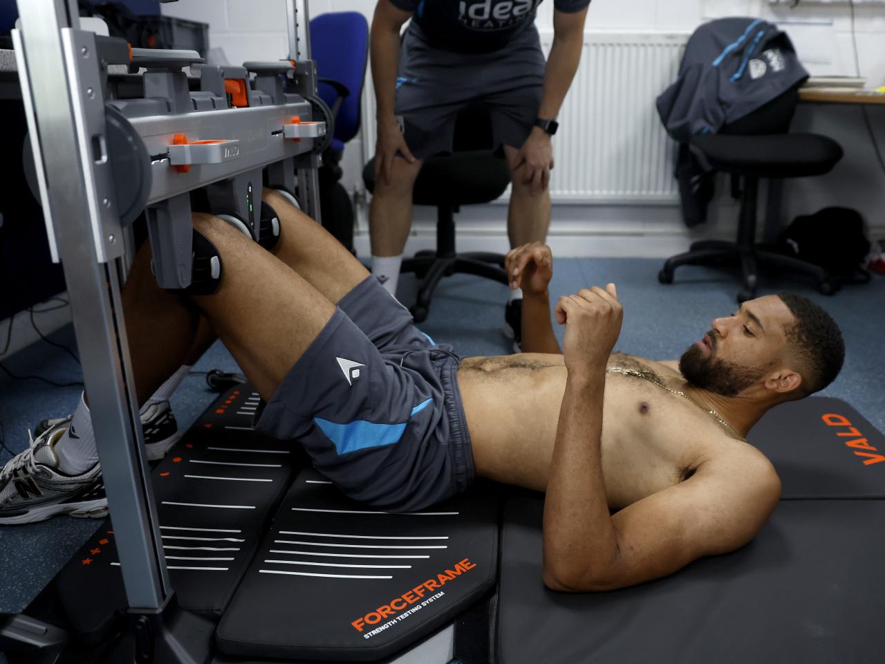 George Campbell is put through medical tests in the gym