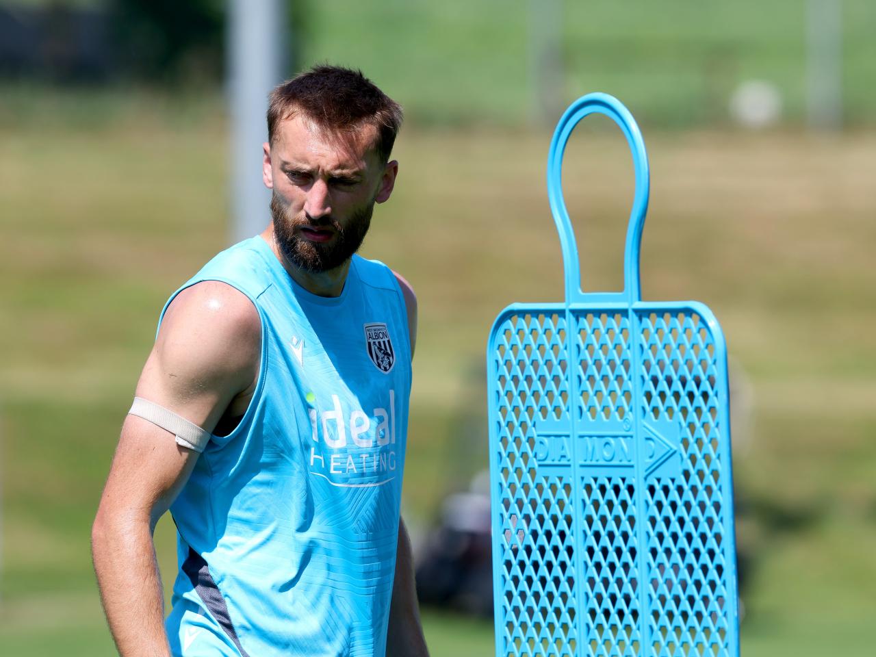 Nat Phillips looking to his right during a training session
