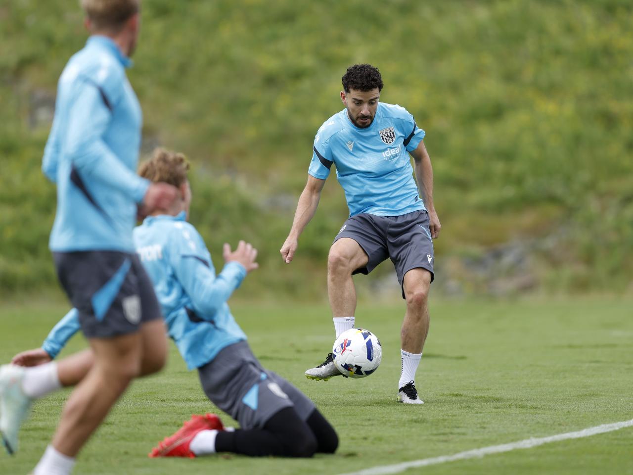 Mikey Johnston on the ball during training 