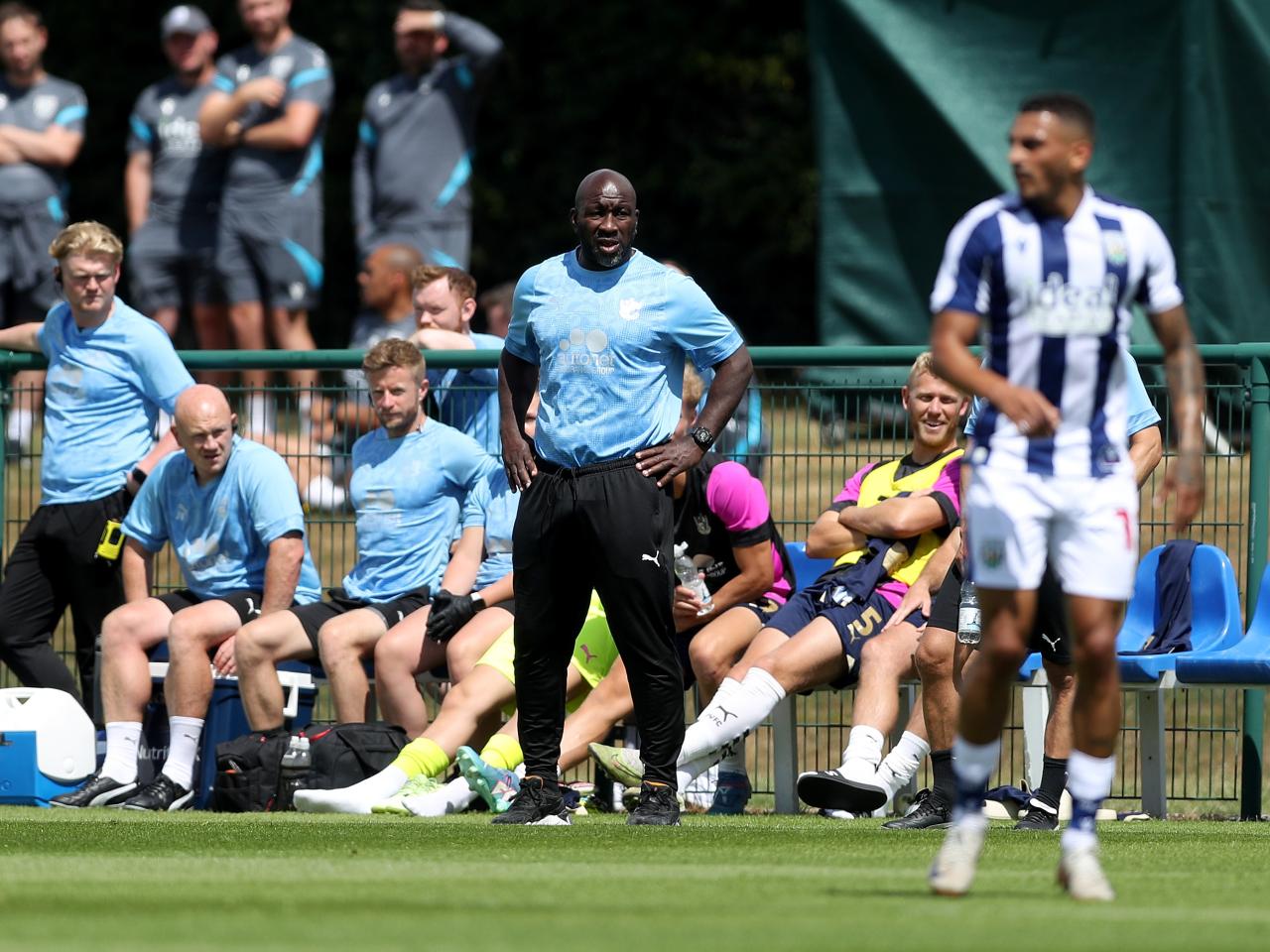 Port Vale boss Darren Moore watching WBA v Port Vale