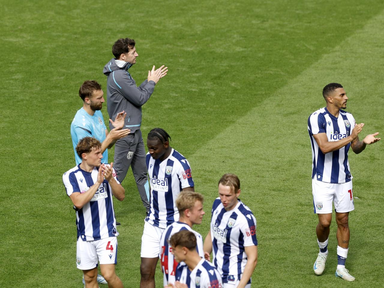 Ryan Mason and Albion players applaud WBA fans after the Blackpool game