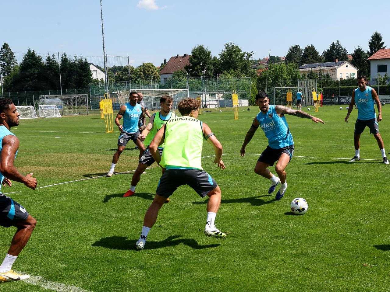 Several players involved in a small-sided game in training