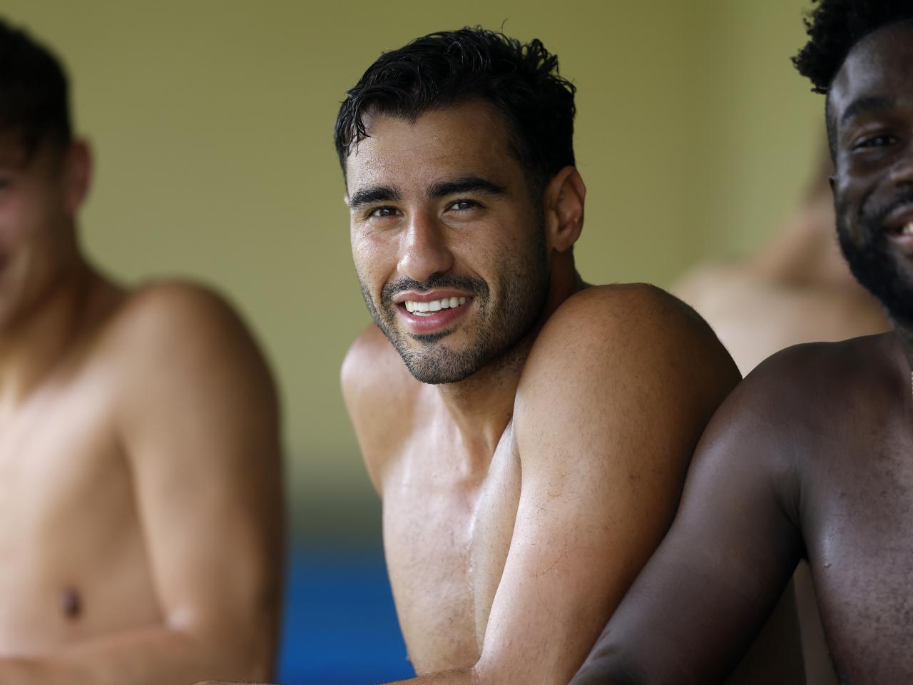 Gianluca Frabotta smiling while sat in an ice bath