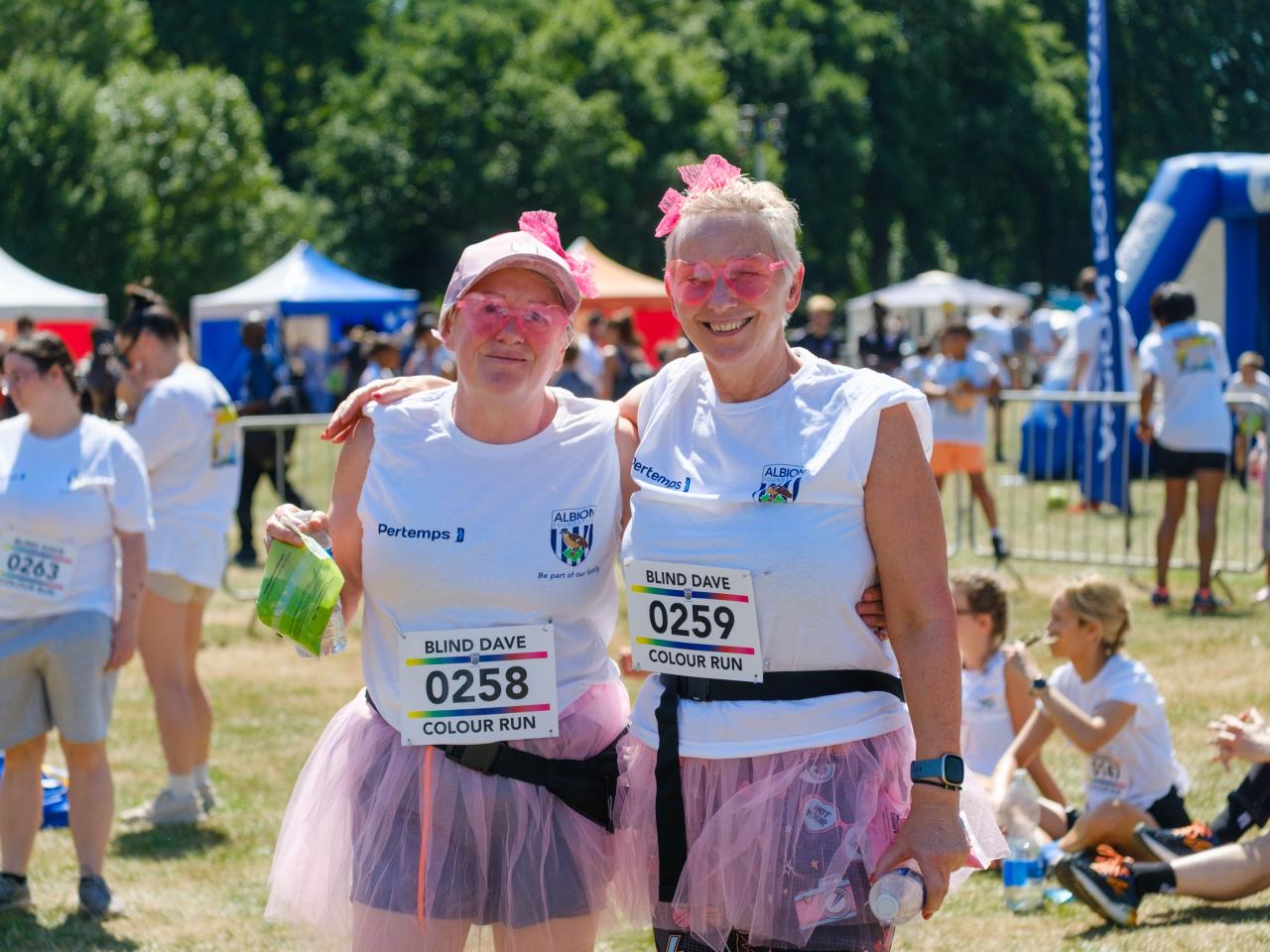 Two participants in pink girls and tutu