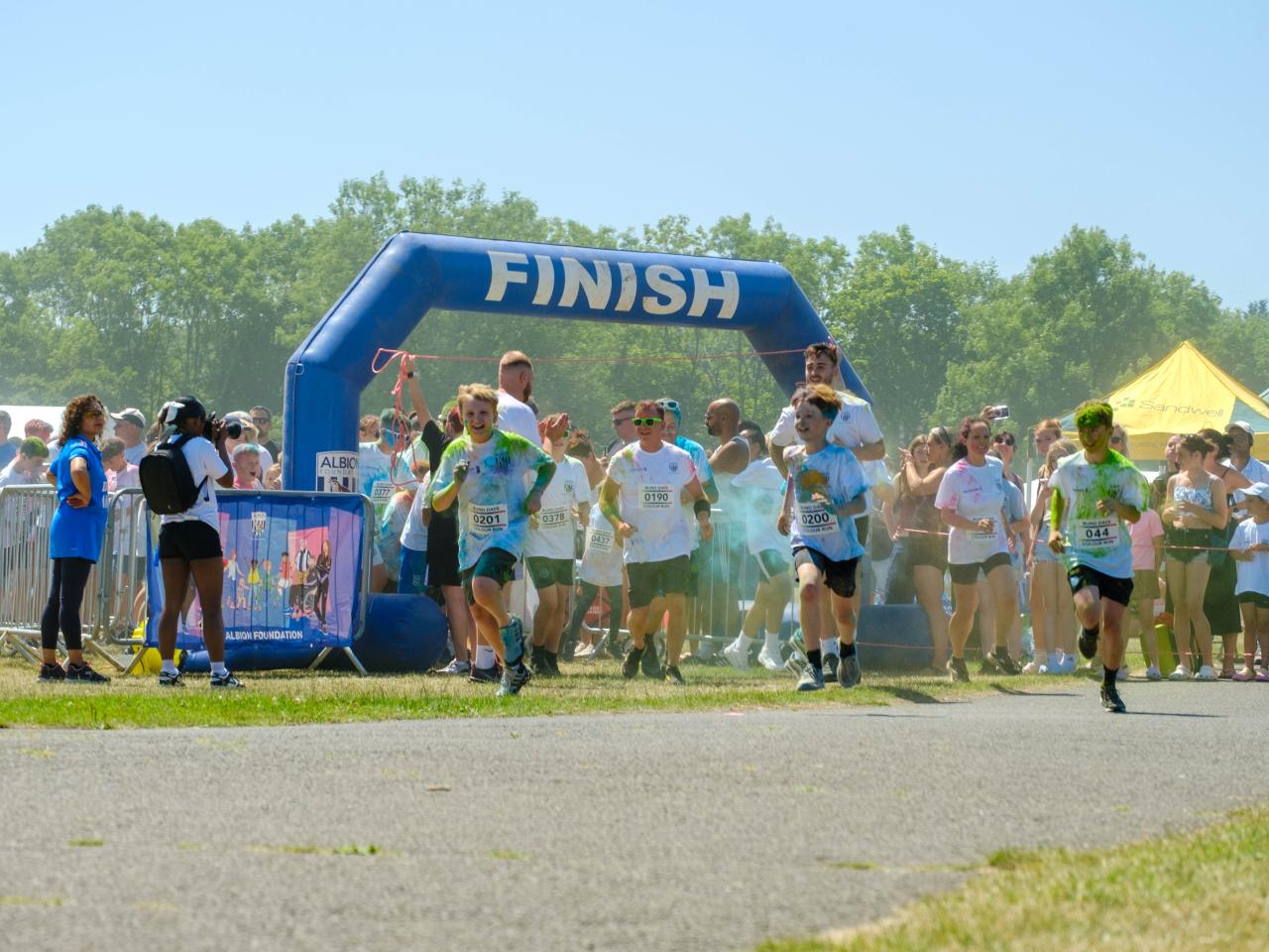 First wave of runners leaving the start line.