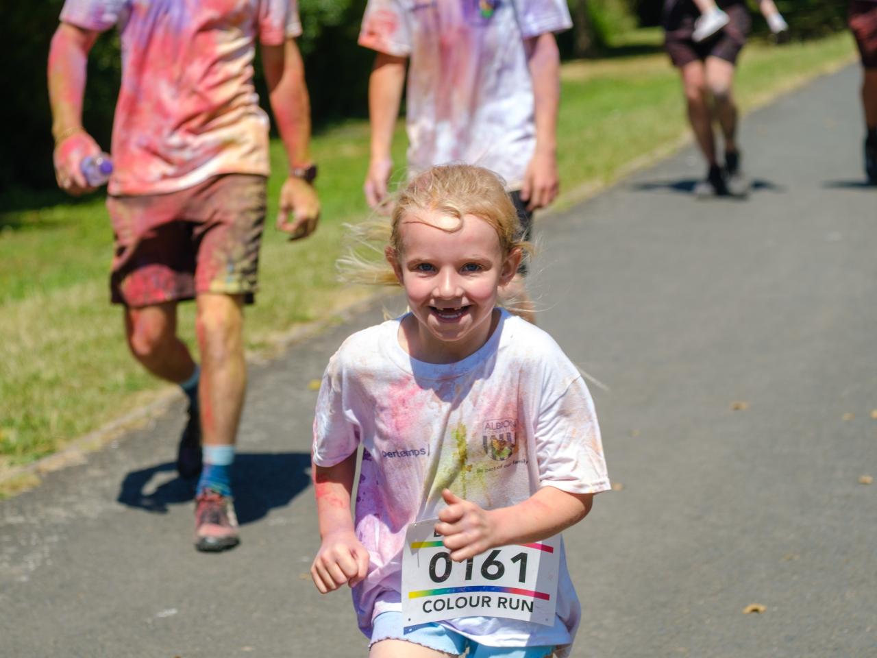 Close up of young girl with huge smile