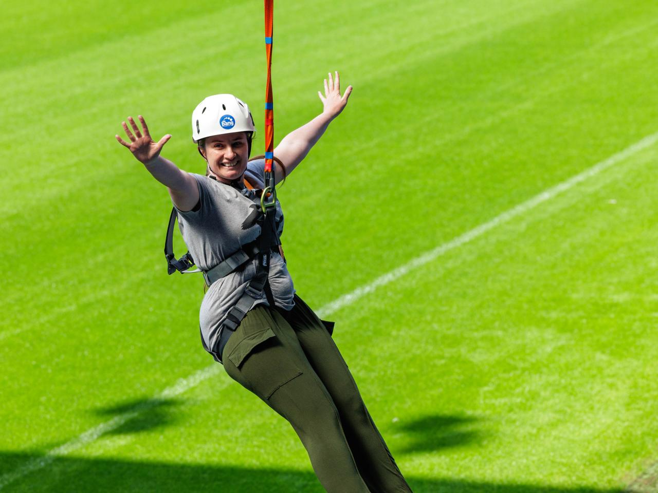 A participant zip wires across The Hawthorns.