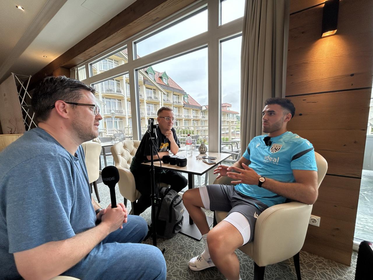 Tammer Bany being interviewed in Austria by journalists 