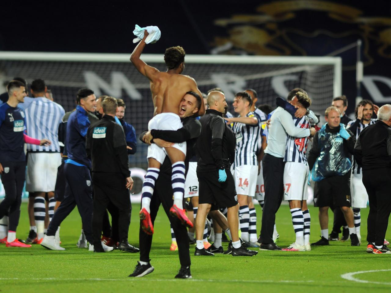 Men's Team Squad Celebrating at The Hawthorns after returning to the Premier League