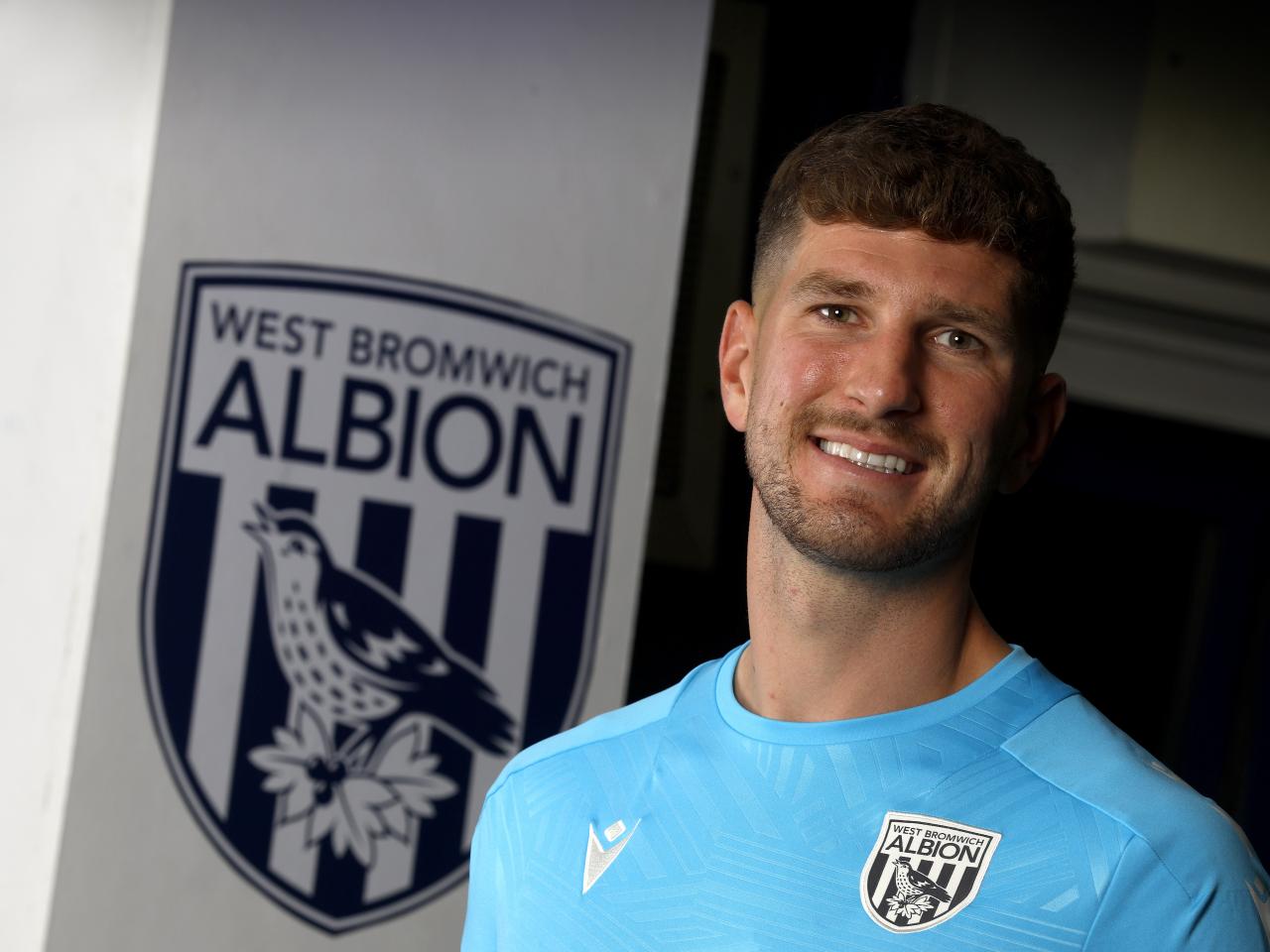 Chris Mepham smiling at the camera 