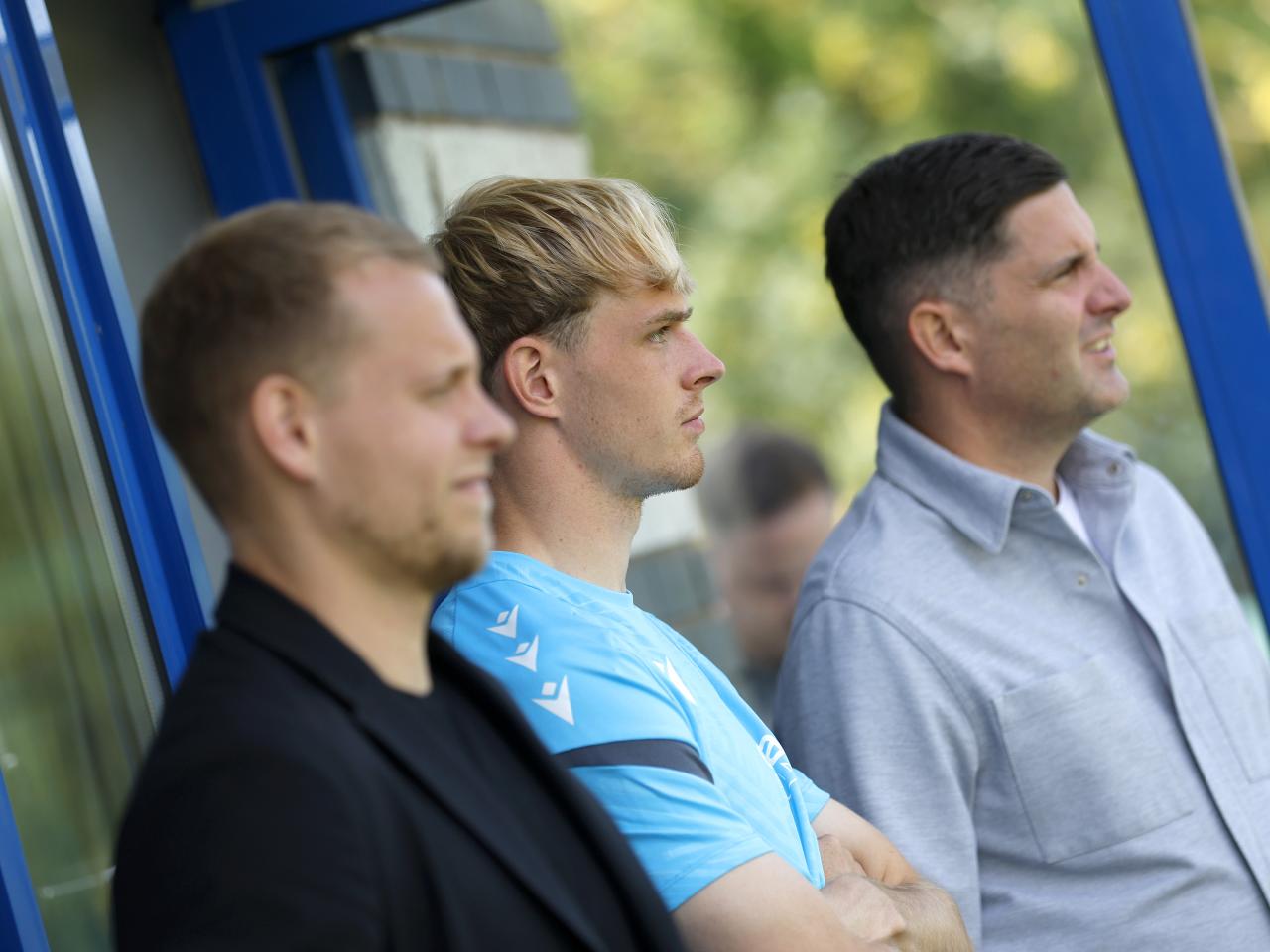 Toby Collyer watching training with his representatives 