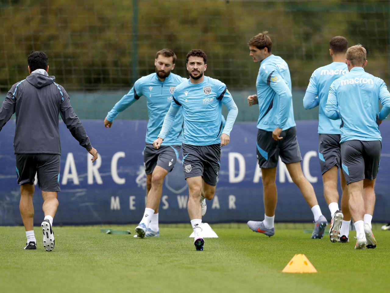 Several players warming up during a training session